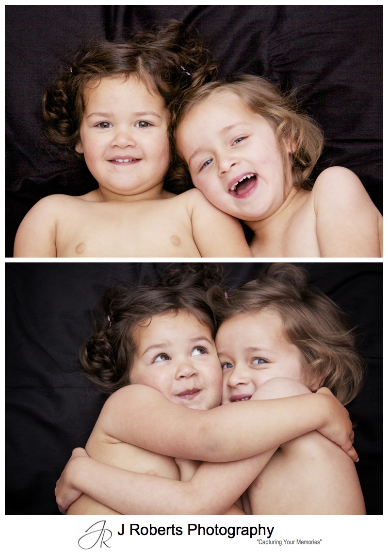 Two sisters laughing and hugging - family portrait photography sydney